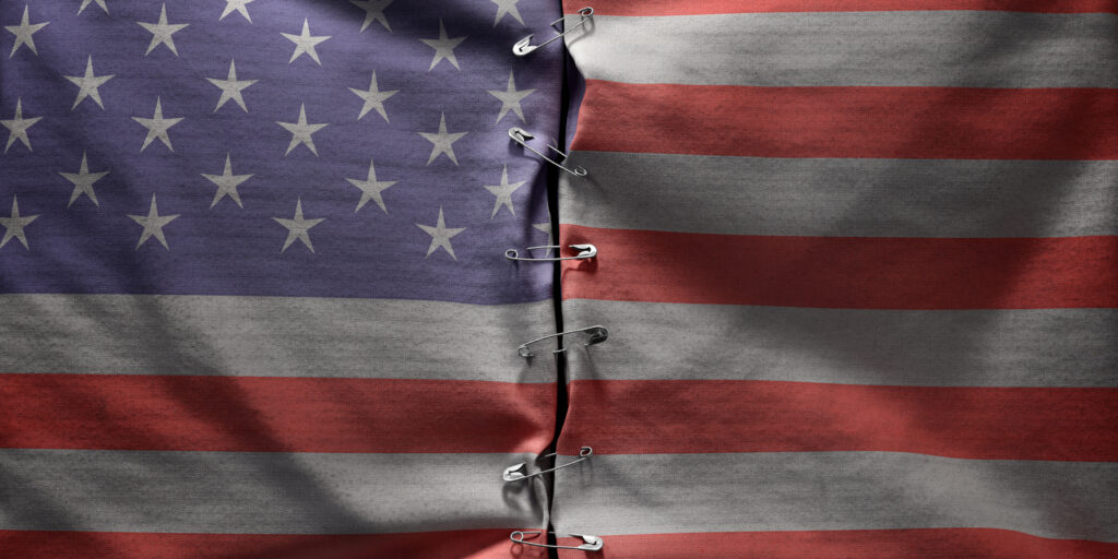 The American Flag held together with safety pins.